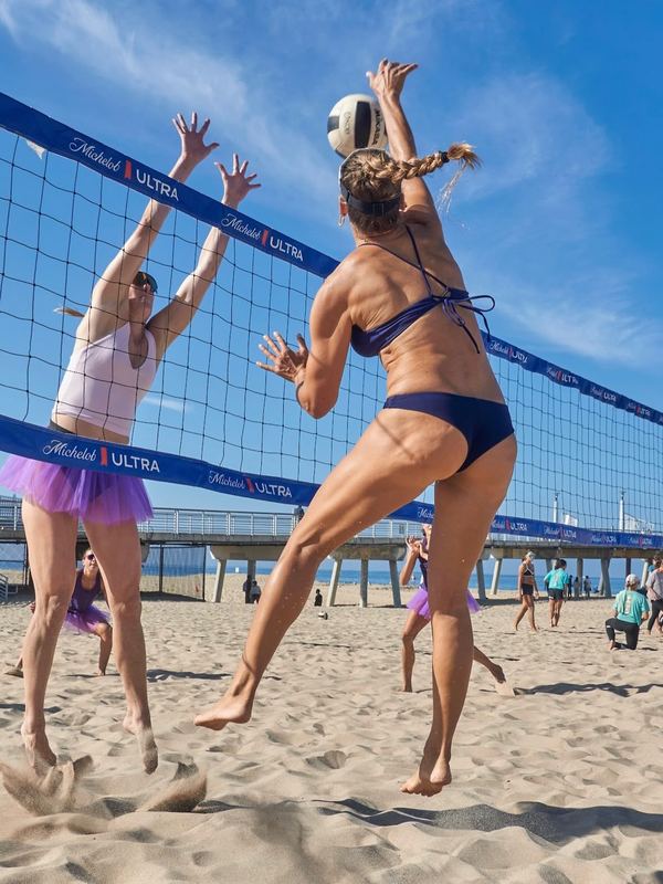 Two players going up at the net during a SoCal Cup 2026 match