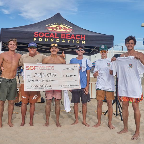 Men's Open 1st place finishers holding their prize check
